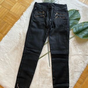 Black waxed canvas skinny jeans